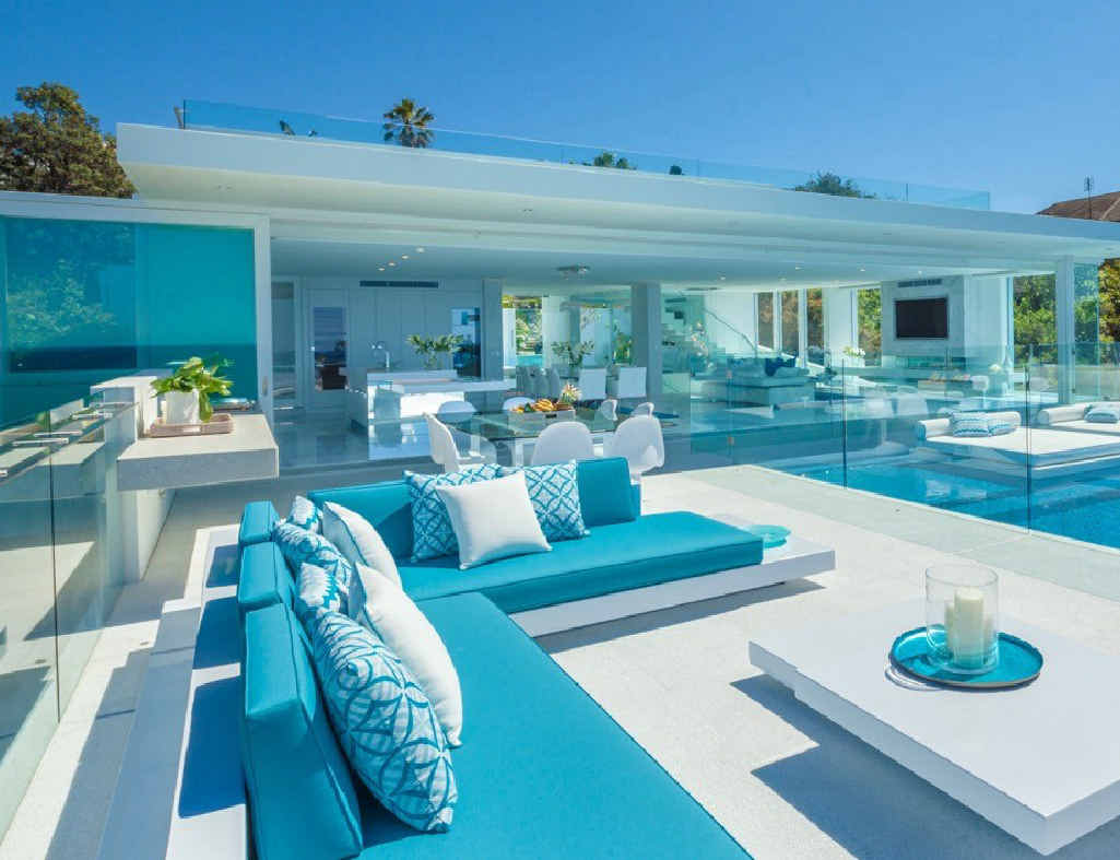DREAM LOCATION: Glen and Deb Watson’s stunning home at Sunshine Beach has become a film set for L’Oreal and, below, the Watsons jostle for space with the crew. DREAM LOCATION: Glen and Deb Watson’s stunning home at Sunshine Beach has become a film set for L’Oreal and, below, the Watsons jostle for space with the crew.