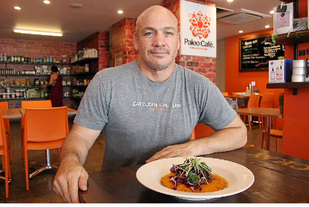 BACK TO BASICS: Michael Harris with a plate of beef cheeks on offer at his Paleo Cafe franchise in Mackay. BACK TO BASICS: Michael Harris with a plate of beef cheeks on offer at his Paleo Cafe franchise in Mackay.