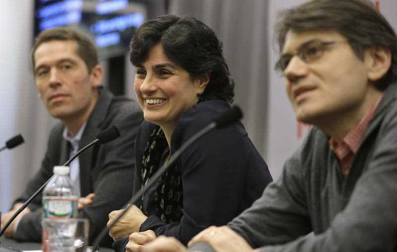 Massachusetts Institute of Technology astrophysics professor Nergis Mavalvala, center, takes questions from members of the media as MIT physics professor Matthew Evans, left, and MIT research scientist Erik Katsavounidis, right, look on during a presentation on the discovery of gravitational waves, Thursday, Feb. 11, 2016, on the school's campus, in Cambridge, Mass. Massachusetts Institute of Technology astrophysics professor Nergis Mavalvala, center, takes questions from members of the media as MIT physics professor Matthew Evans, left, and MIT research scientist Erik Katsavounidis, right, look on during a presentation on the discovery of gravitational waves, Thursday, Feb. 11, 2016, on the school's campus, in Cambridge, Mass.