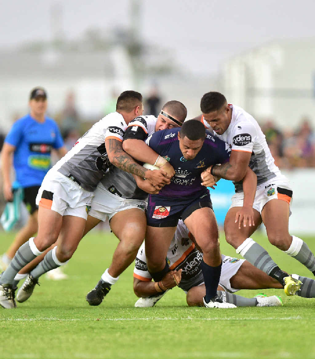 STRONG: The Tigers defence was powerful at Sunshine Coast Stadium last night. STRONG: The Tigers defence was powerful at Sunshine Coast Stadium last night.