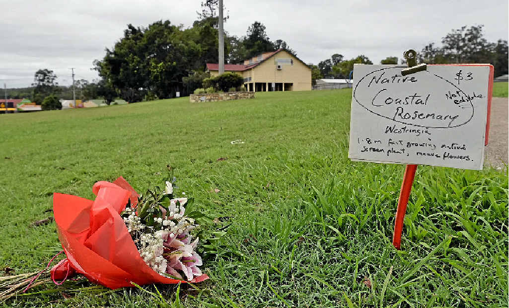 SAD LOSS: Nadine and Darrell Williams pay their respects where a woman died after a car rolled down a hill at the Pomona Markets. SAD LOSS: Nadine and Darrell Williams pay their respects where a woman died after a car rolled down a hill at the Pomona Markets.