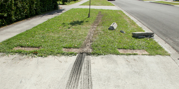 Skid marks from a car that regularly marks the driveway and grass verge outside Andy Sinclair's house. Hawke's Bay Today photograph by Warren Buckland Skid marks from a car that regularly marks the driveway and grass verge outside Andy Sinclair's house. Hawke's Bay Today photograph by Warren Buckland