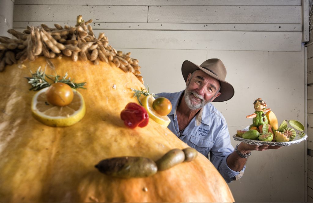 Maclean Show fruit and vegetable section judge Clive Taylor has a closer look at the small and big novelty entries at the Maclean Show. Photo Adam Hourigan / The Daily Examiner Maclean Show fruit and vegetable section judge Clive Taylor has a closer look at the small and big novelty entries at the Maclean Show. Photo Adam Hourigan / The Daily Examiner
