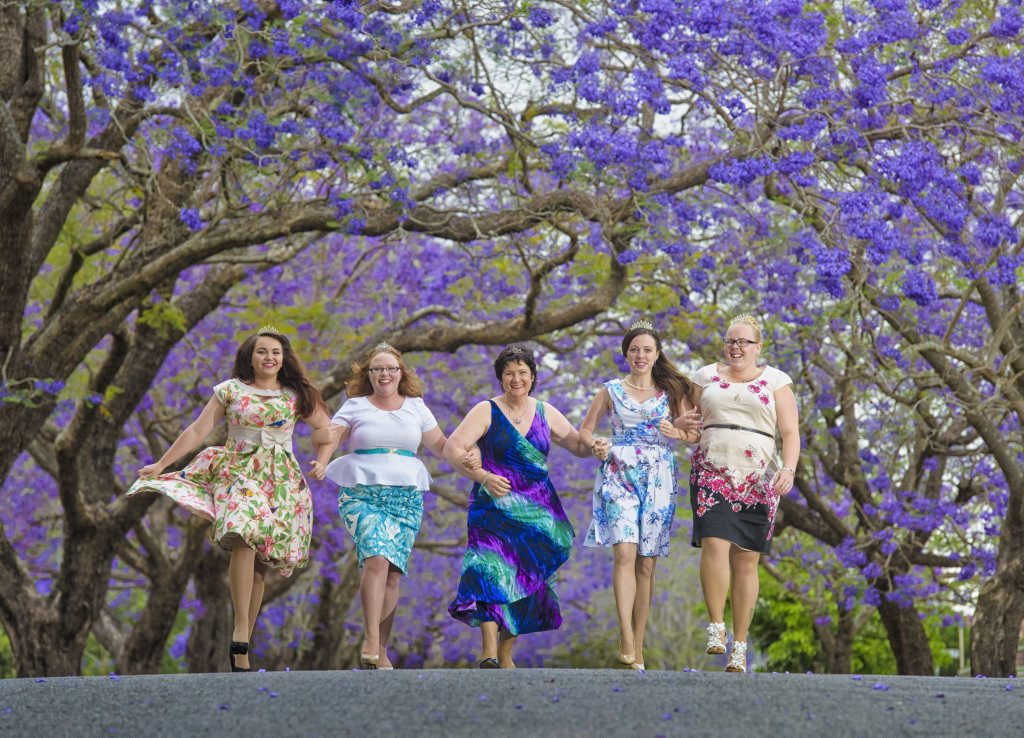 The smiles may match the brightness of the bloom behind them, but tomorrow night there'll be some nerves for the Jacaranda Party (l-r) Charlotte White, Leah Wallace, Matron of Honour Debbie Bowling, Kirsten Knox and Kahlia Payne as they wait to see who is crowned Queen of the Jacarandas for 2015.Photo Adam Hourigan / The Daily Examiner The smiles may match the brightness of the bloom behind them, but tomorrow night there'll be some nerves for the Jacaranda Party (l-r) Charlotte White, Leah Wallace, Matron of Honour Debbie Bowling, Kirsten Knox and Kahlia Payne as they wait to see who is crowned Queen of the Jacarandas for 2015.Photo Adam Hourigan / The Daily Examiner
