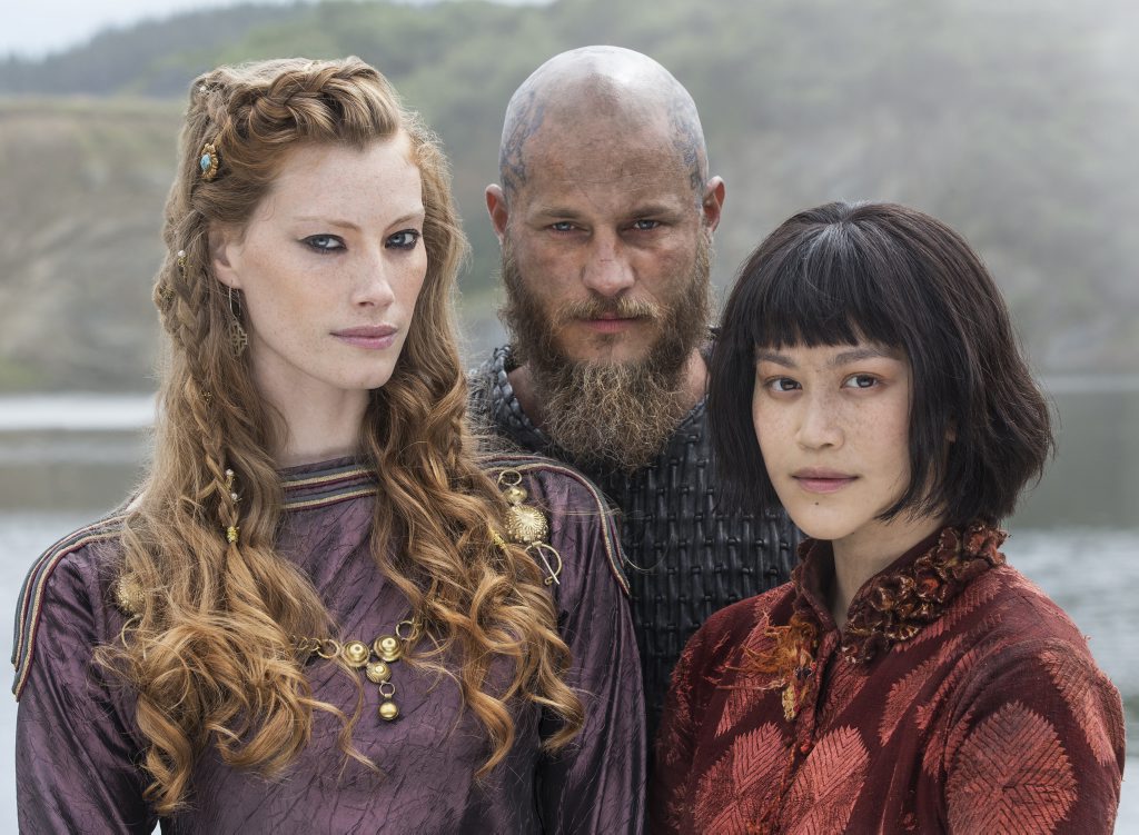 Alyssa Sutherland, Travis Fimmel and Dianne Doan star in season four of Vikings. Alyssa Sutherland, Travis Fimmel and Dianne Doan star in season four of Vikings.
