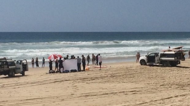Paramedics and lifeguards worked unsuccessfully for more than an hour to revive a man pulled unconscious from the surf at Broadbeach. Photo: Amanda Abate / 7 News
Paramedics and lifeguards worked unsuccessfully for more than an hour to revive a man pulled unconscious from the surf at Broadbeach. Photo: Amanda Abate / 7 News