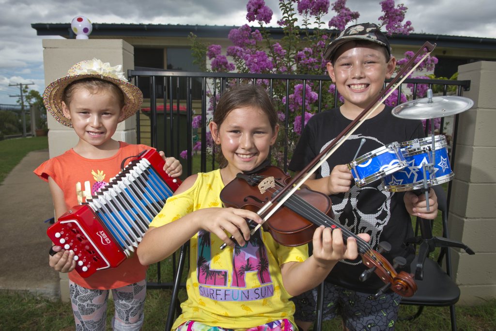 Siblings Sienna, 6, Lily, 10 and Jaxon Watson, 9 decided to jam out curb side after, pop said they were making too much noise.Photo Paul Braven / The Observer Siblings Sienna, 6, Lily, 10 and Jaxon Watson, 9 decided to jam out curb side after, pop said they were making too much noise.Photo Paul Braven / The Observer