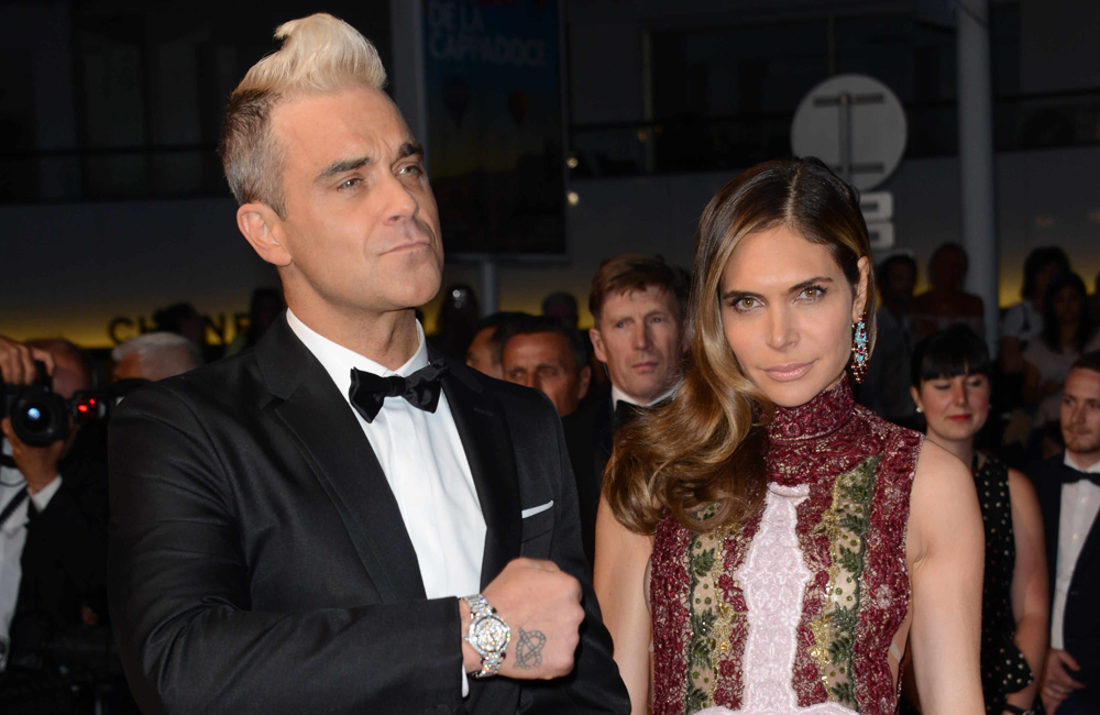 Robbie Williams' wife says he acted like an excited teenager when she took him on his first supermarket trip in years. Robbie Williams' wife says he acted like an excited teenager when she took him on his first supermarket trip in years.