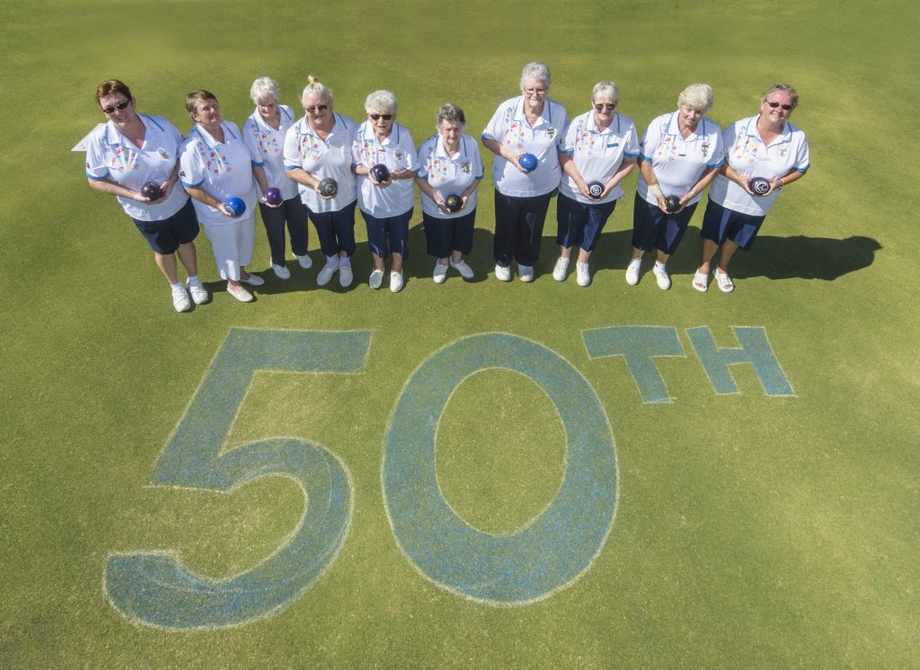 The women of the Wooli Women's bowling club line up for a photo on their 50th anniversary. The women of the Wooli Women's bowling club line up for a photo on their 50th anniversary.