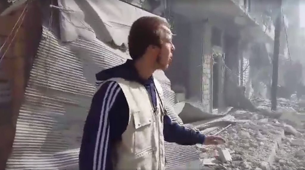 Oliver Bridgeman among the ruins of Aleppo after a Russian airstrike. Photo Contributed Oliver Bridgeman among the ruins of Aleppo after a Russian airstrike. Photo Contributed