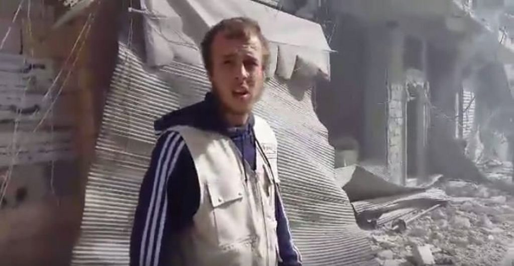 Oliver Bridgeman among the ruins of Aleppo after a Russian airstrike. Photo Contributed Oliver Bridgeman among the ruins of Aleppo after a Russian airstrike. Photo Contributed