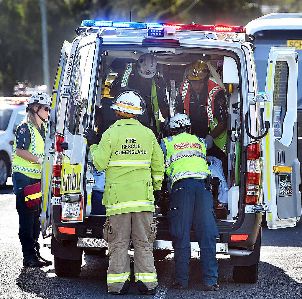 Bus and car crash at the intersection of Pialba-Burrum Heads Rd and Petersens Rd. A young patient is placed in the ambulance. Photo: Alistair Brightman / Fraser Coast Chronicle Bus and car crash at the intersection of Pialba-Burrum Heads Rd and Petersens Rd. A young patient is placed in the ambulance. Photo: Alistair Brightman / Fraser Coast Chronicle