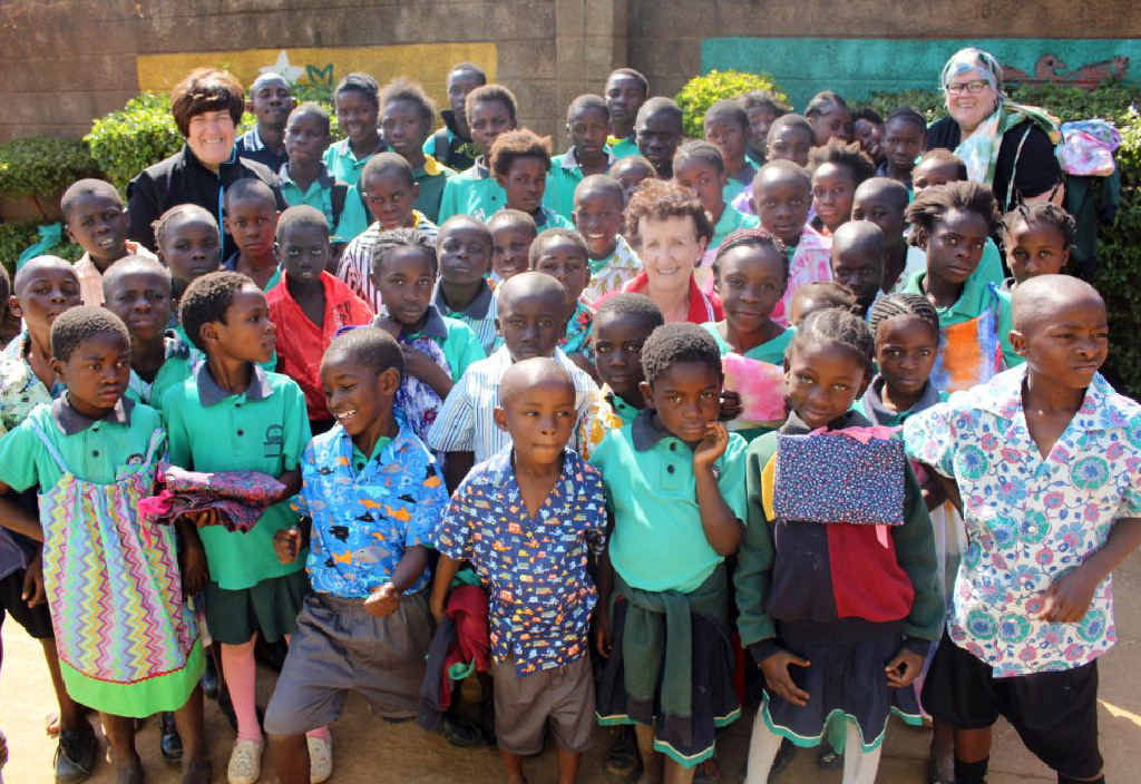 A beneficiary group makes and donates a shirt for each of the 50 Our Rainbow House students. A beneficiary group makes and donates a shirt for each of the 50 Our Rainbow House students.