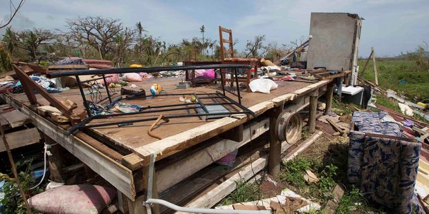 The roof lifted and blew away, slamming into the side of the neighbour's house 100m away. Then the walls came down, folding outwards and crashing to the ground. The roof lifted and blew away, slamming into the side of the neighbour's house 100m away. Then the walls came down, folding outwards and crashing to the ground.