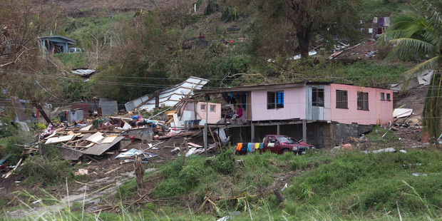 One house survives, the other taken, in the town of Rakiraki, after Cyclone Winston hit Fiji. One house survives, the other taken, in the town of Rakiraki, after Cyclone Winston hit Fiji.