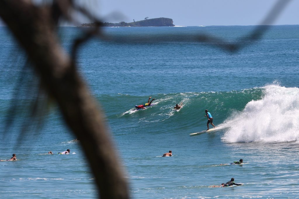 WATCH Double Island Point packed as surfers chase waves Sunshine