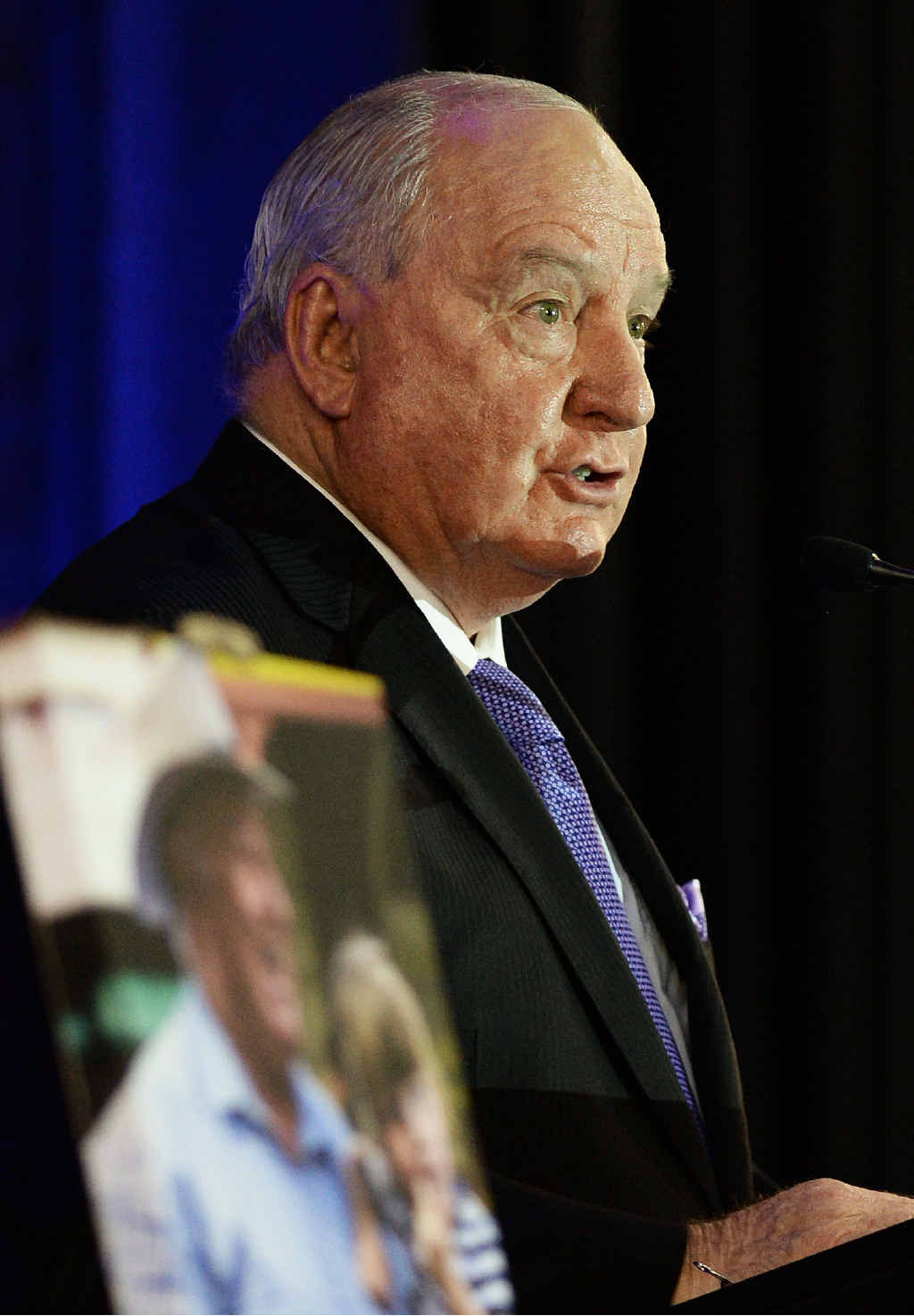 IN DEFENCE: Alan Jones delivers a tribute at the funeral of Steve Jones at the Gatton Indoor Sports Centre on Friday. IN DEFENCE: Alan Jones delivers a tribute at the funeral of Steve Jones at the Gatton Indoor Sports Centre on Friday.