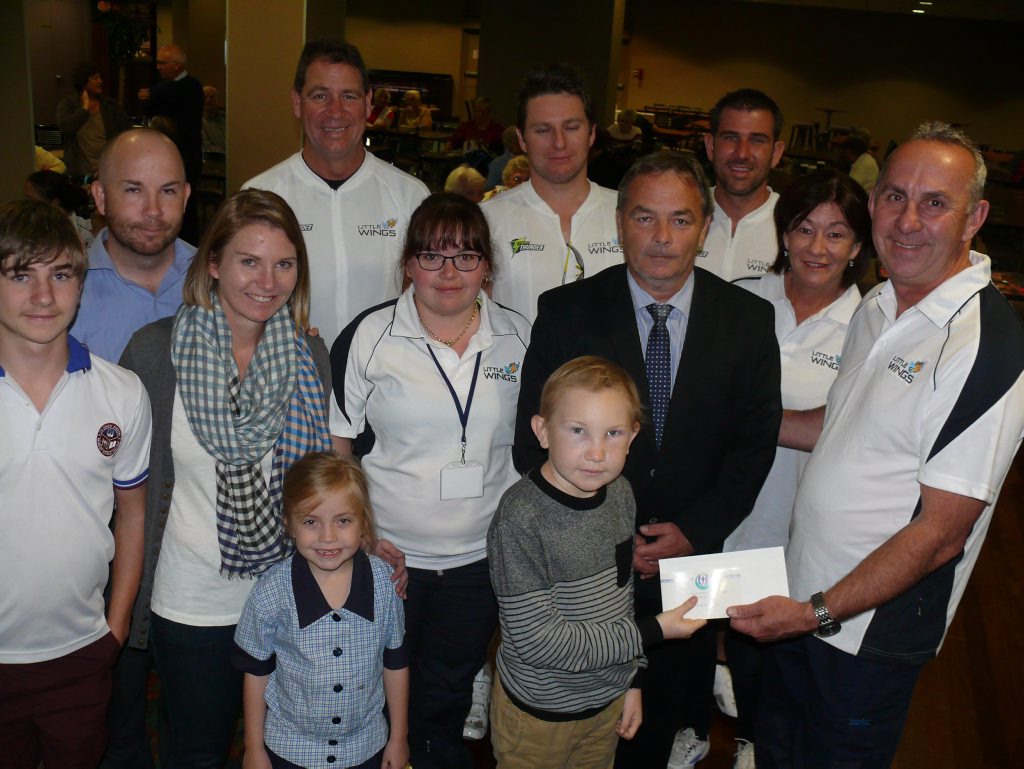Front row - Sam Carroll presents a cheque for $400 to Little Wings boss Kevin Robinson. Looking on: Middle row, from left: Hugh Carroll, Angela Carroll, Alecia Treloar, St Joseph's principal Frank Jones, Little Wings media person Caroline Norman. Back row from left: Adam Carroll, Craig Madsen, Elijah Treloar and Aaron Fitzgerald. Photo Tim Howard / Daily Examiner Front row - Sam Carroll presents a cheque for $400 to Little Wings boss Kevin Robinson. Looking on: Middle row, from left: Hugh Carroll, Angela Carroll, Alecia Treloar, St Joseph's principal Frank Jones, Little Wings media person Caroline Norman. Back row from left: Adam Carroll, Craig Madsen, Elijah Treloar and Aaron Fitzgerald. Photo Tim Howard / Daily Examiner