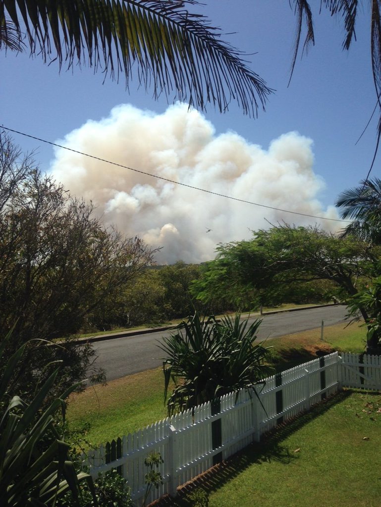 CHOPPER: Wooli resident Nikki Voss snapped this picture of the fire outside her shack. CHOPPER: Wooli resident Nikki Voss snapped this picture of the fire outside her shack.