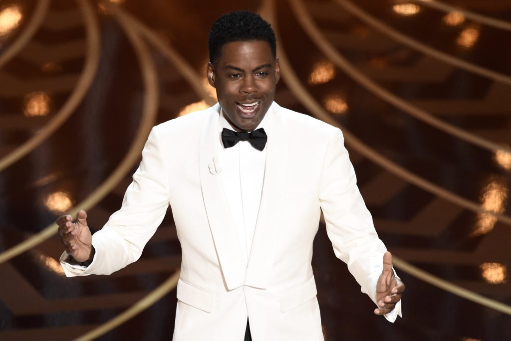 Host Chris Rock speaks at the Oscars at the Dolby Theatre in Los Angeles. Host Chris Rock speaks at the Oscars at the Dolby Theatre in Los Angeles.