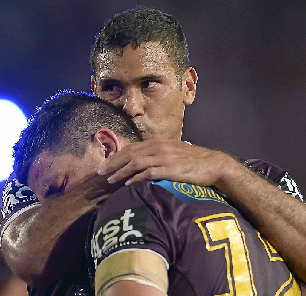 SAD DAY: Justin Hodges consoles Matt Gillett after the grand final defeat to Cowboys. SAD DAY: Justin Hodges consoles Matt Gillett after the grand final defeat to Cowboys.
