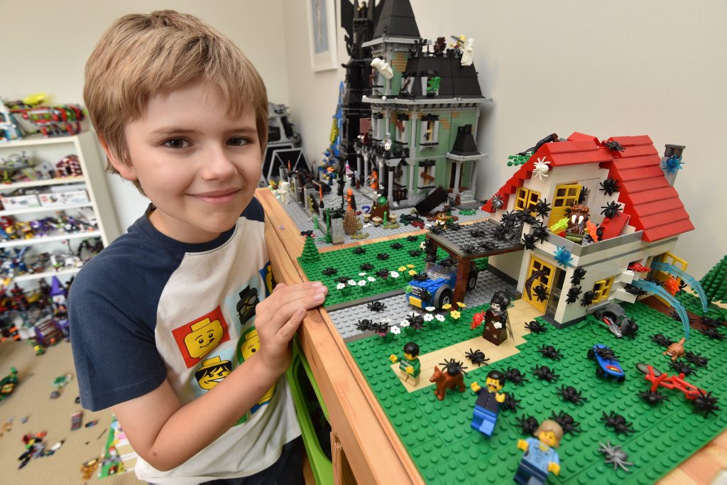 Lego land - 9 yr old Harrison Mason in his Lego room. Lego land - 9 yr old Harrison Mason in his Lego room.