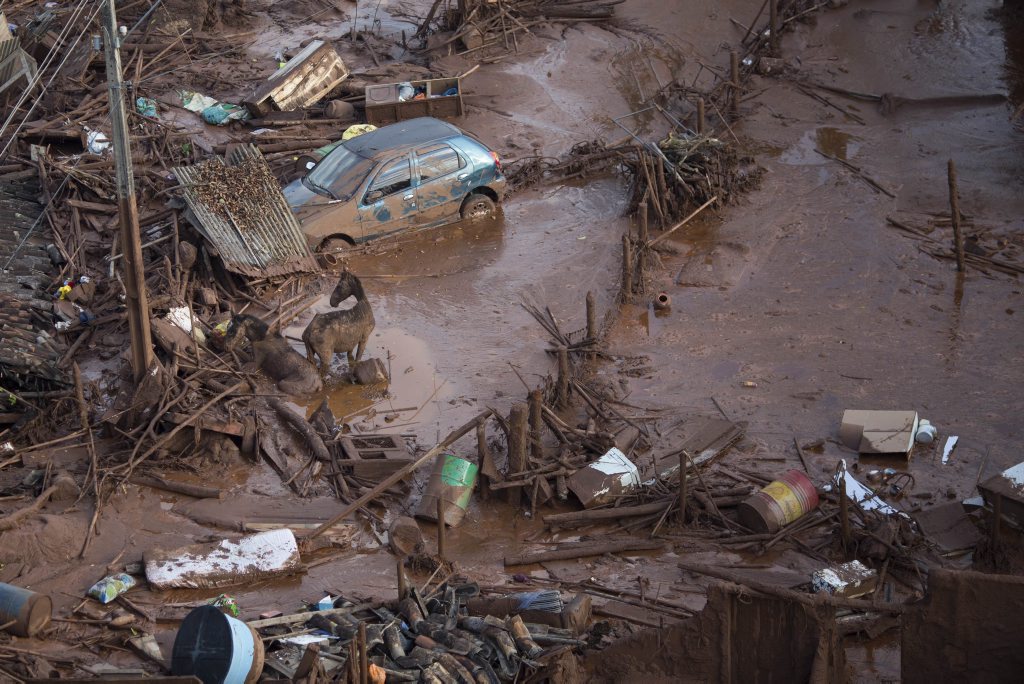 Horses struggle in the mud in the small town of Bento Rodrigues, Minas Gerais, Brazil after a dam burst on Friday, November 6, 2015. Mud flowed into the village 7km downhill from the Samarco iron ore mine in the mountainous area. (AP Photo/Felipe Dana) Horses struggle in the mud in the small town of Bento Rodrigues, Minas Gerais, Brazil after a dam burst on Friday, November 6, 2015. Mud flowed into the village 7km downhill from the Samarco iron ore mine in the mountainous area. (AP Photo/Felipe Dana)