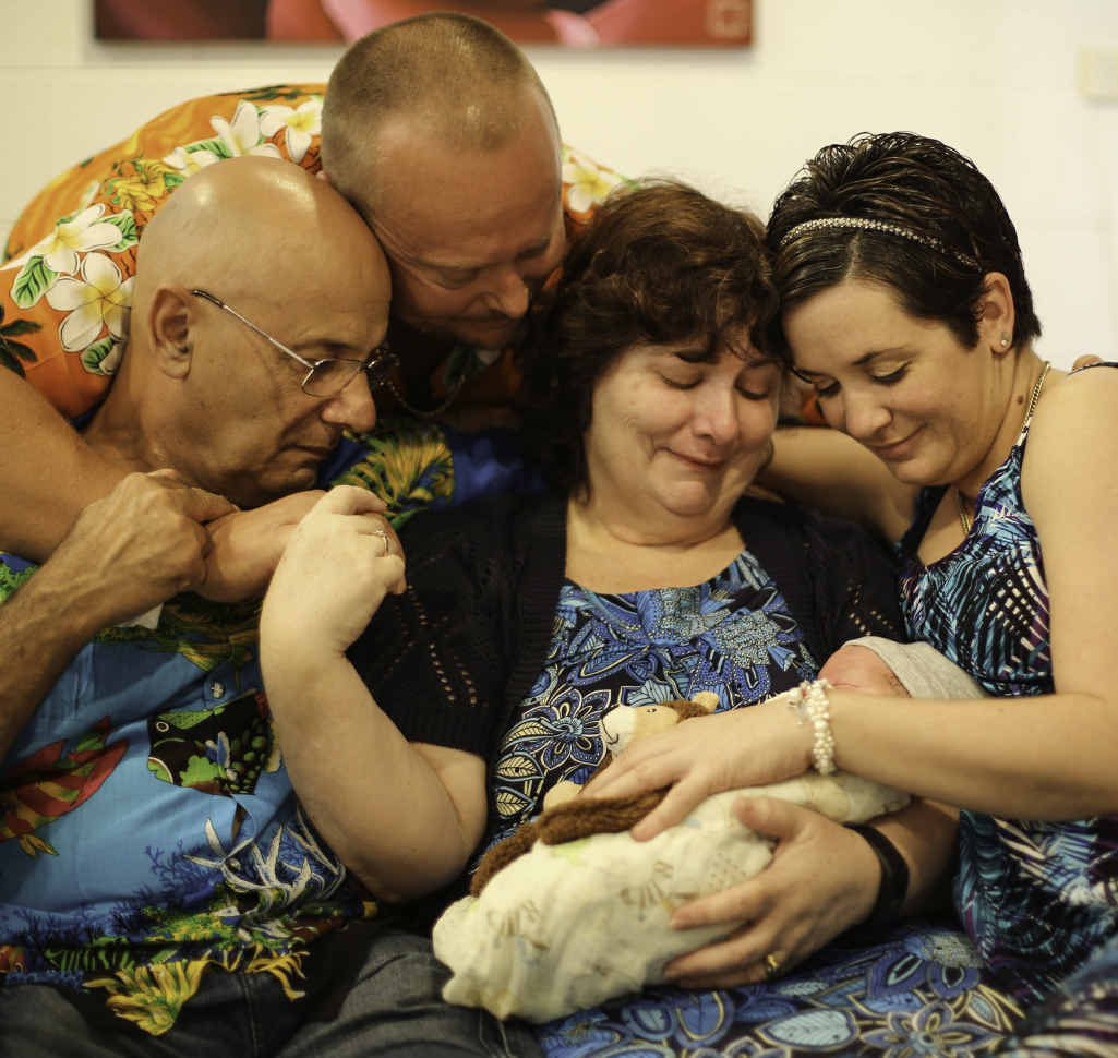 GOODBYE: Baby Wesley’s parents Craig and Aimee Carson, and grandparents Charles and Chris Portelli. GOODBYE: Baby Wesley’s parents Craig and Aimee Carson, and grandparents Charles and Chris Portelli.