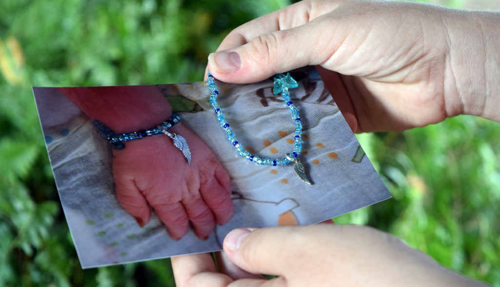 Aimee Carson holds a bracelet worn by her son, Wesley. Aimee Carson holds a bracelet worn by her son, Wesley.