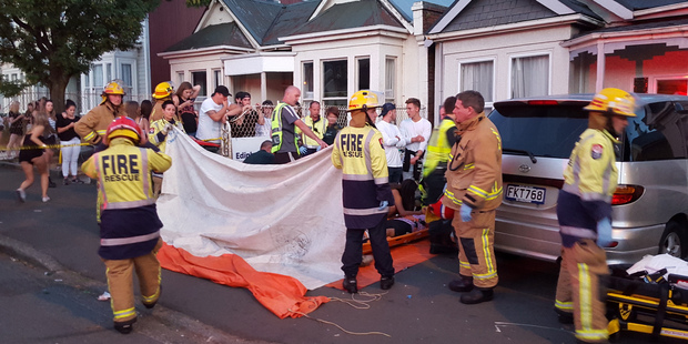 Emergency services tend to victims. Photo / James Gunn Emergency services tend to victims. Photo / James Gunn
