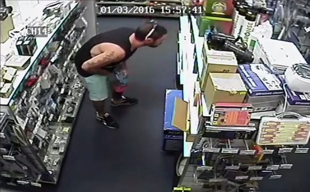 The man adjusts his pants. The man adjusts his pants.