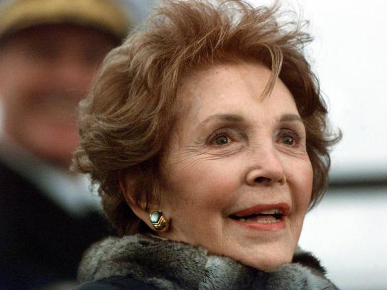 Nancy Reagan looks on during the christening of a US aircraft carrier in 2001
Nancy Reagan looks on during the christening of a US aircraft carrier in 2001