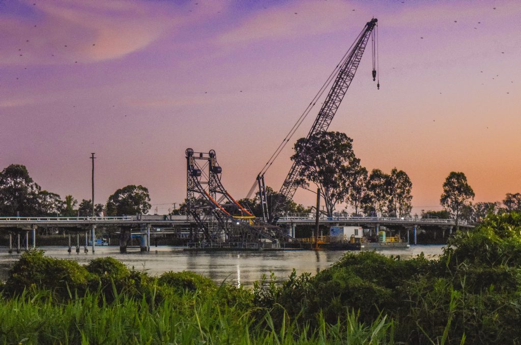 The McFarlane Bridge sits waiting at sunset for its newly restored tower to be replaced on the bridge after they were taken away and restored earlier in the year. The McFarlane Bridge sits waiting at sunset for its newly restored tower to be replaced on the bridge after they were taken away and restored earlier in the year.