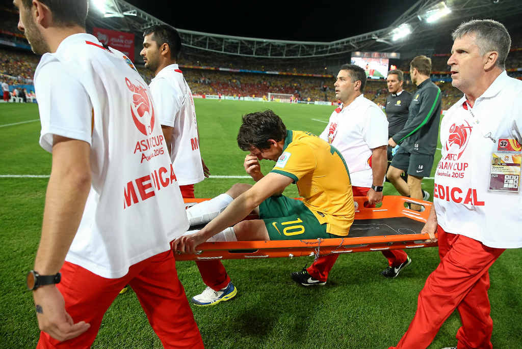 PAINFUL MEMORY: Robbie Kruse is taken off with an Achille injury in the Asian Cup final. PAINFUL MEMORY: Robbie Kruse is taken off with an Achille injury in the Asian Cup final.