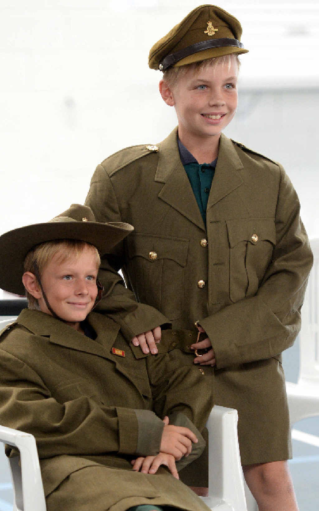 LEST WE FORGET: Bargara State School students Dylan Theuerkauf and Jake Thompson dress in First World War uniforms during an educational talk by Michael and Donna Fiechtner. LEST WE FORGET: Bargara State School students Dylan Theuerkauf and Jake Thompson dress in First World War uniforms during an educational talk by Michael and Donna Fiechtner.