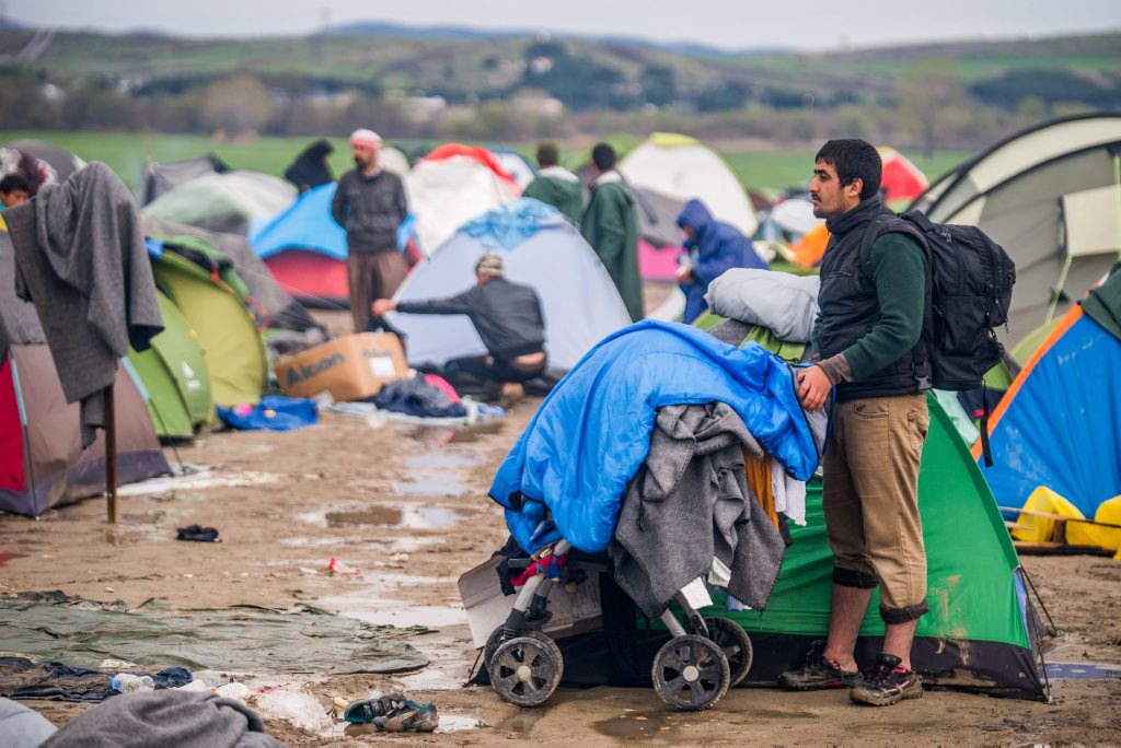 STUCK: Asylum seekers wait on Greece’s border with Macedonia. STUCK: Asylum seekers wait on Greece’s border with Macedonia.