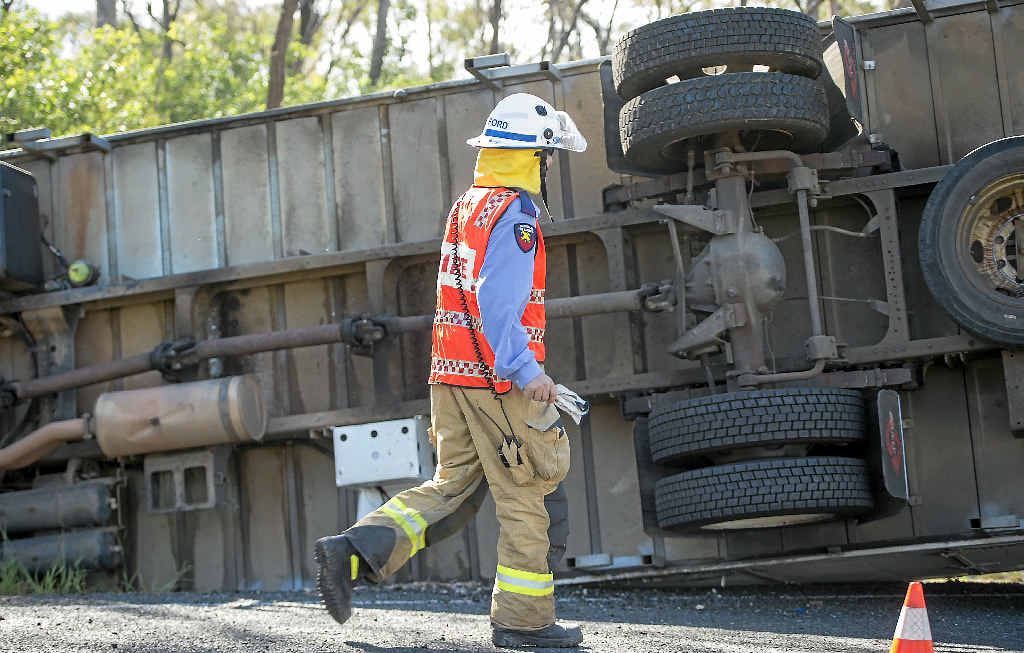 CRASH SCENE: Truck driver Arthur Jack Richardson (inset) was fined $1000 after he fell asleep at the wheel leading to this crash last month. CRASH SCENE: Truck driver Arthur Jack Richardson (inset) was fined $1000 after he fell asleep at the wheel leading to this crash last month.
