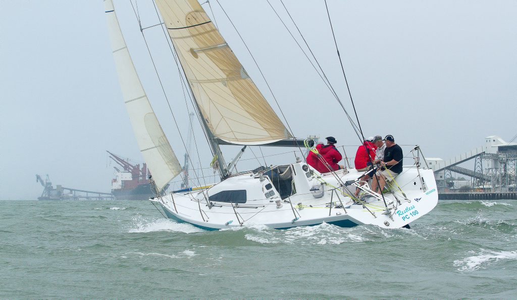 RESTLESS: Battling grey and windy conditions last week is currently on the water to Brisbane ahead of the Brisbane to Gladstone race which starts on Good Friday. RESTLESS: Battling grey and windy conditions last week is currently on the water to Brisbane ahead of the Brisbane to Gladstone race which starts on Good Friday.
