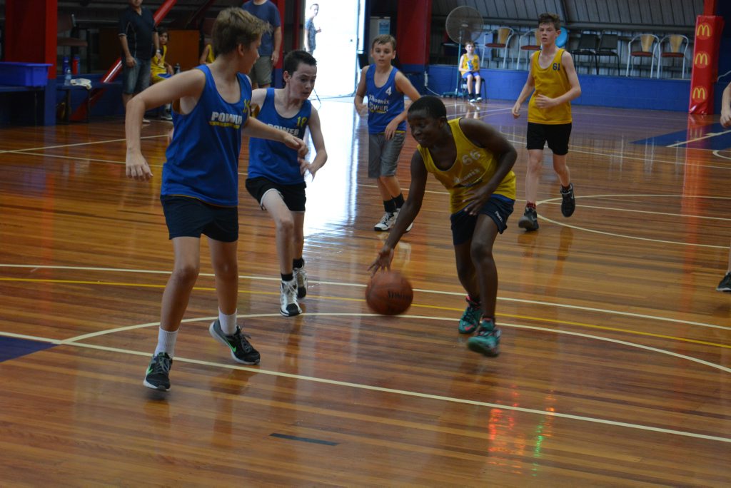 DRIVING FORCE: Dream Team's Albert Maunga starred in the under 14 grand final. Photo Nick Kossatch / Observer DRIVING FORCE: Dream Team's Albert Maunga starred in the under 14 grand final. Photo Nick Kossatch / Observer