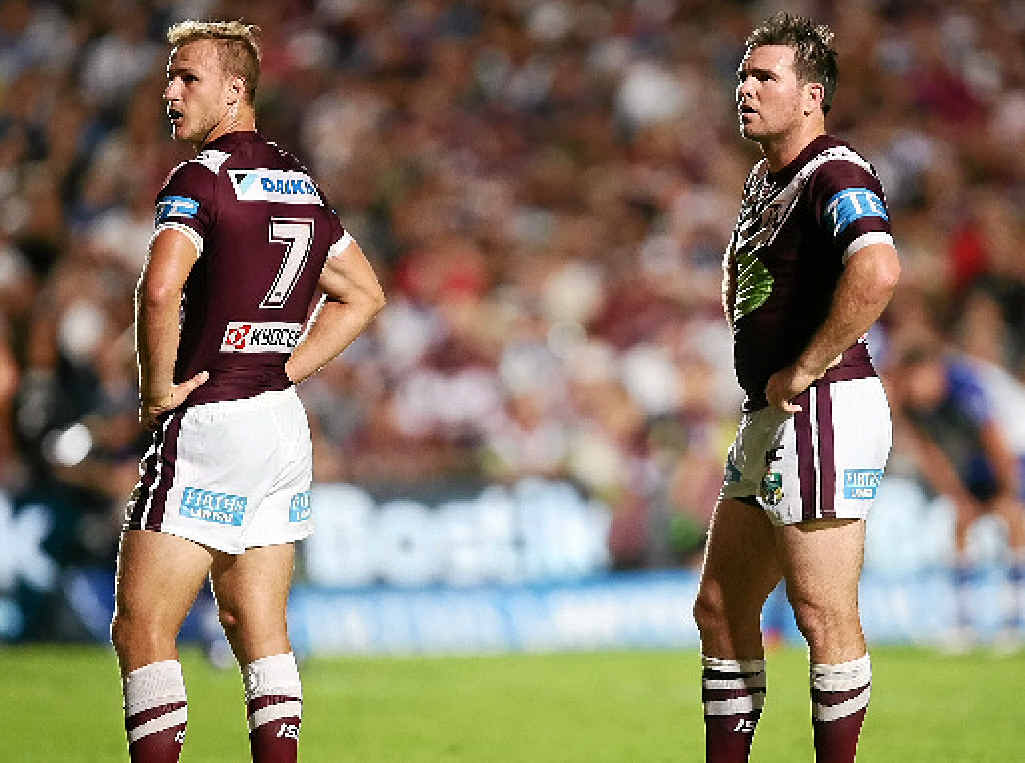 Daly Cherry-Evans and Jamie Lyon, of the Manly Sea Eagles. Photo: Getty Images. Daly Cherry-Evans and Jamie Lyon, of the Manly Sea Eagles. Photo: Getty Images.