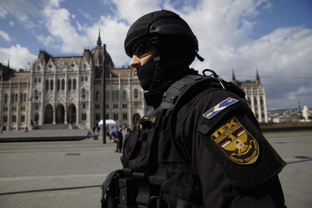 A member of the Counter Terrorism Centre (TEK) patrols the area in front of the Parliament in downtown Budapest, Hungary, Tuesday, March 22, 2016. Hungary raised its terrorism awareness level to grade 2 after a series of attacks in Brussels. (Zoltan Balogh/MTI via AP) A member of the Counter Terrorism Centre (TEK) patrols the area in front of the Parliament in downtown Budapest, Hungary, Tuesday, March 22, 2016. Hungary raised its terrorism awareness level to grade 2 after a series of attacks in Brussels. (Zoltan Balogh/MTI via AP)