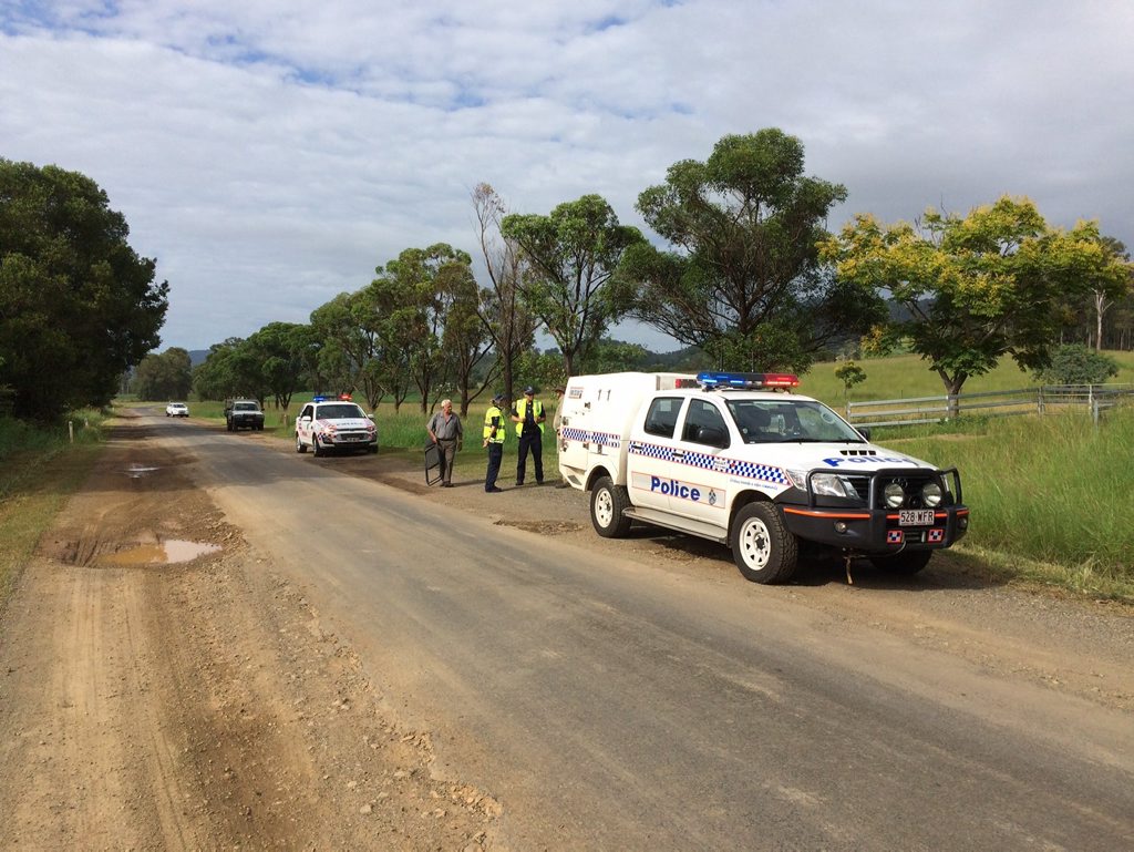 Police speak with residents on Maleny-Kenilworth Rd where locals blocked the road to protest what they believe are unsafe conditions. Police speak with residents on Maleny-Kenilworth Rd where locals blocked the road to protest what they believe are unsafe conditions.