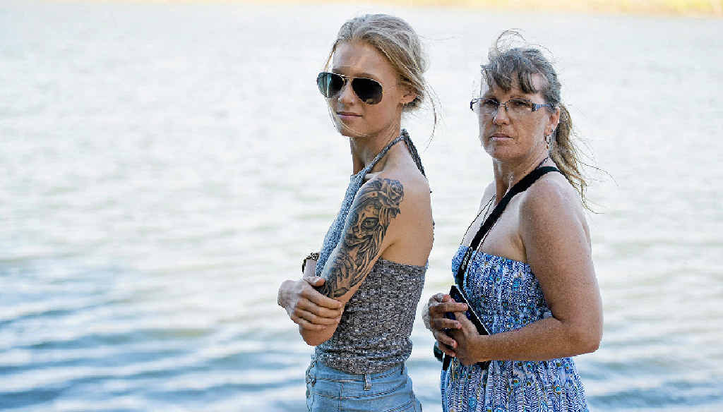 WATERY GRAVE: Karen and Natasha Lange were heartbroken when they found out the boat their dad built, Kumba, had sunk in the Boyne River. WATERY GRAVE: Karen and Natasha Lange were heartbroken when they found out the boat their dad built, Kumba, had sunk in the Boyne River.