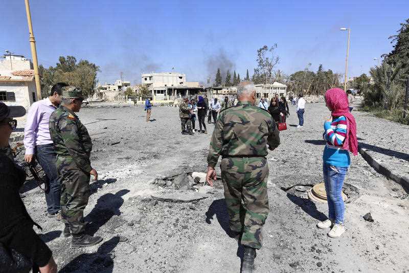 Explosions rocked the ancient town of Palmyra on Friday and on the horizon, black smoke wafted behind its majestic Roman ruins, as Syrian army experts carefully detonated hundreds of mines they say were planted by Islamic State militants before they fled the town. Explosions rocked the ancient town of Palmyra on Friday and on the horizon, black smoke wafted behind its majestic Roman ruins, as Syrian army experts carefully detonated hundreds of mines they say were planted by Islamic State militants before they fled the town.