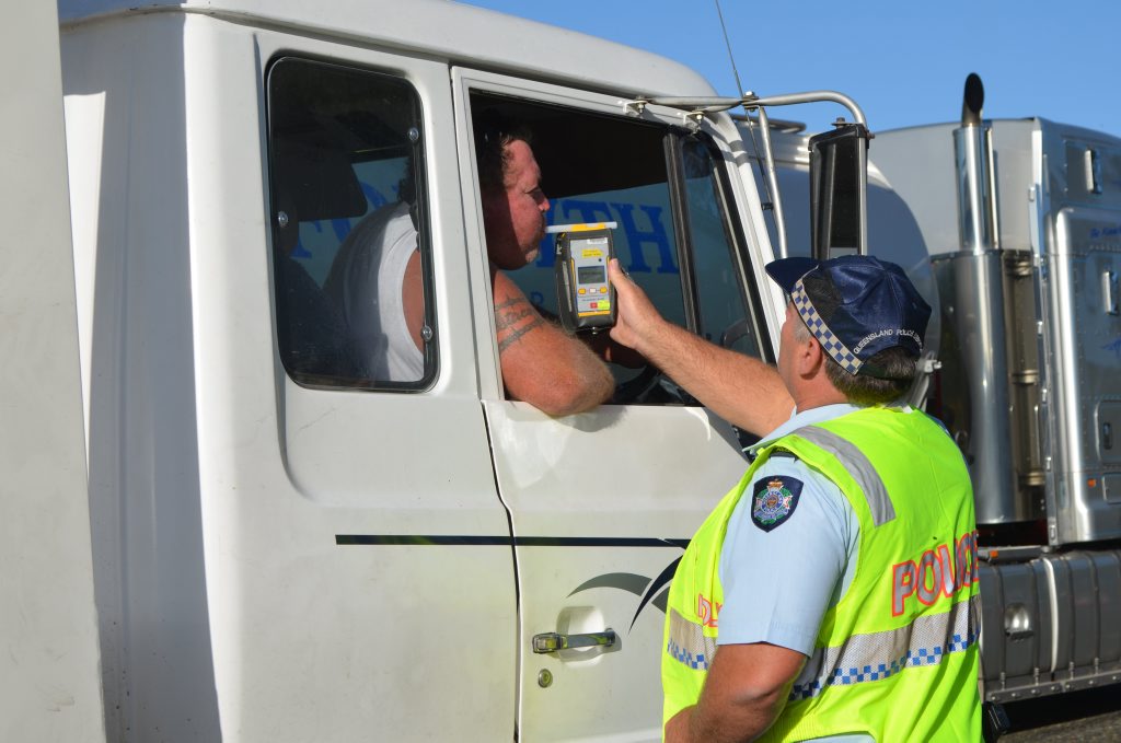 TESTING: Truck driver pulled over during Police operation to reduce the road toll. Photo: Jodie Dixon / Isis Town & Country TESTING: Truck driver pulled over during Police operation to reduce the road toll. Photo: Jodie Dixon / Isis Town & Country