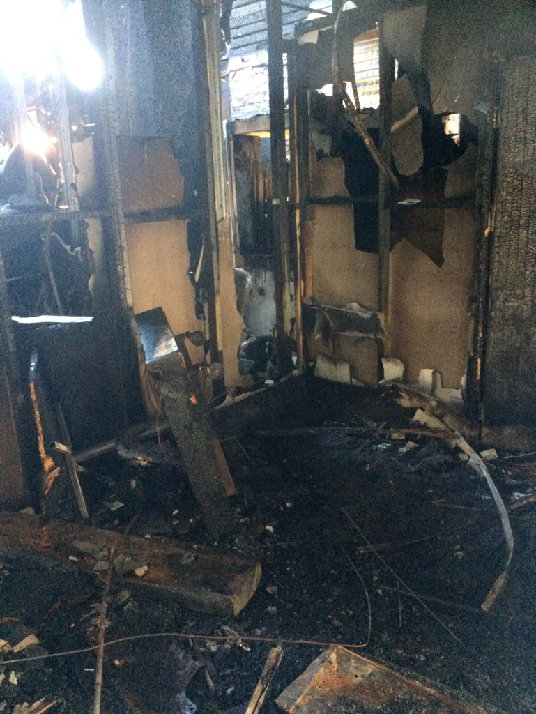 The fire destroyed the inside of the building. The fire destroyed the inside of the building.
