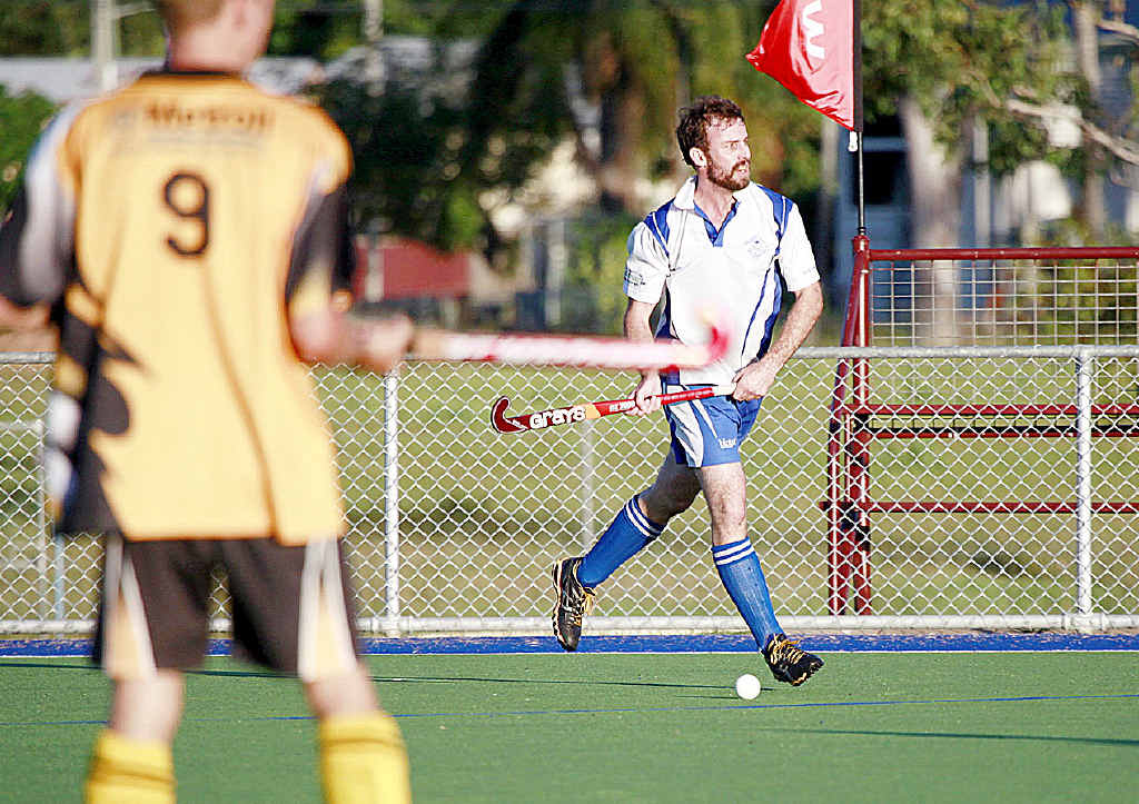 TOUGH BATTLE: Wallaroos’ Tony Dakin aims his hit in the men’s hockey match against Granville in Maryborough on Saturday. TOUGH BATTLE: Wallaroos’ Tony Dakin aims his hit in the men’s hockey match against Granville in Maryborough on Saturday.