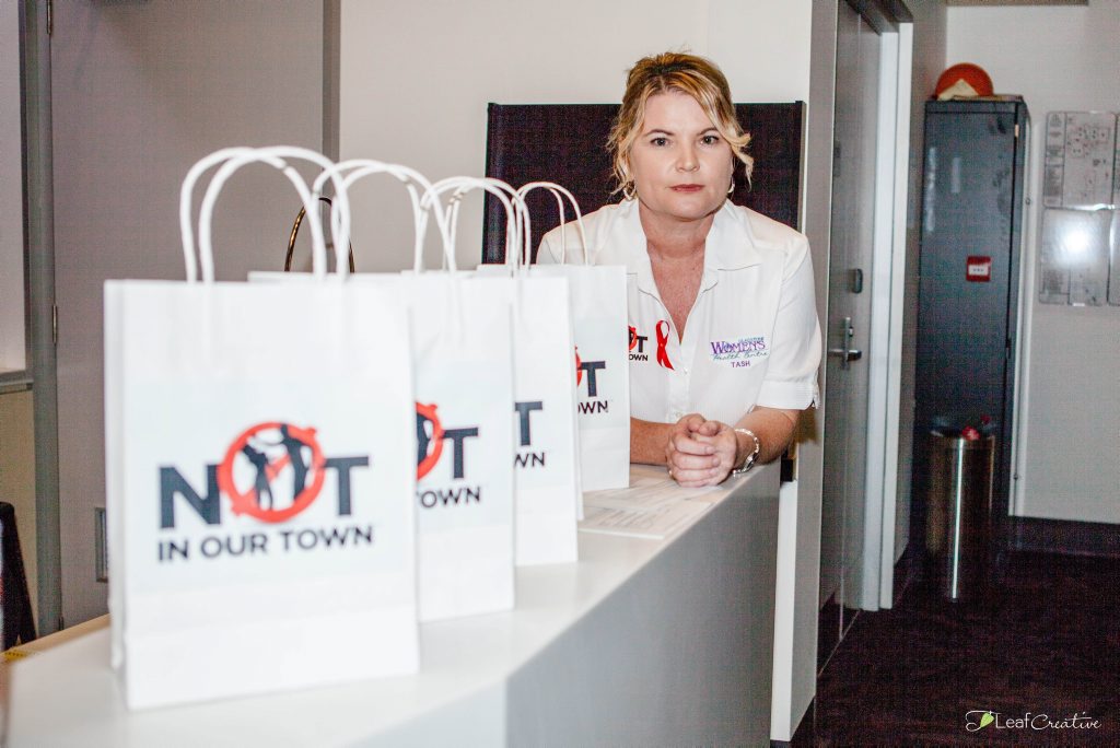 NOT IN OUR TOWN: Tash Fee at the Women's Health Centre says having three abusive partners put their hand up for help is encouraging. Contributed: Leaf Creative. NOT IN OUR TOWN: Tash Fee at the Women's Health Centre says having three abusive partners put their hand up for help is encouraging. Contributed: Leaf Creative.