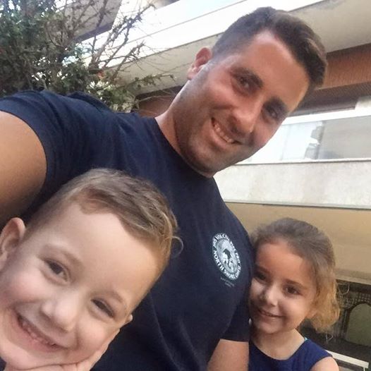 Ali Elamine with his children. Ali Elamine with his children.