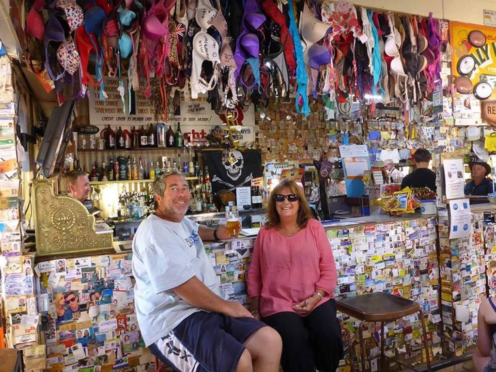 This couple got a close look at the type of memorabilia that many travellers leave behind at the Daly Waters Pub This couple got a close look at the type of memorabilia that many travellers leave behind at the Daly Waters Pub